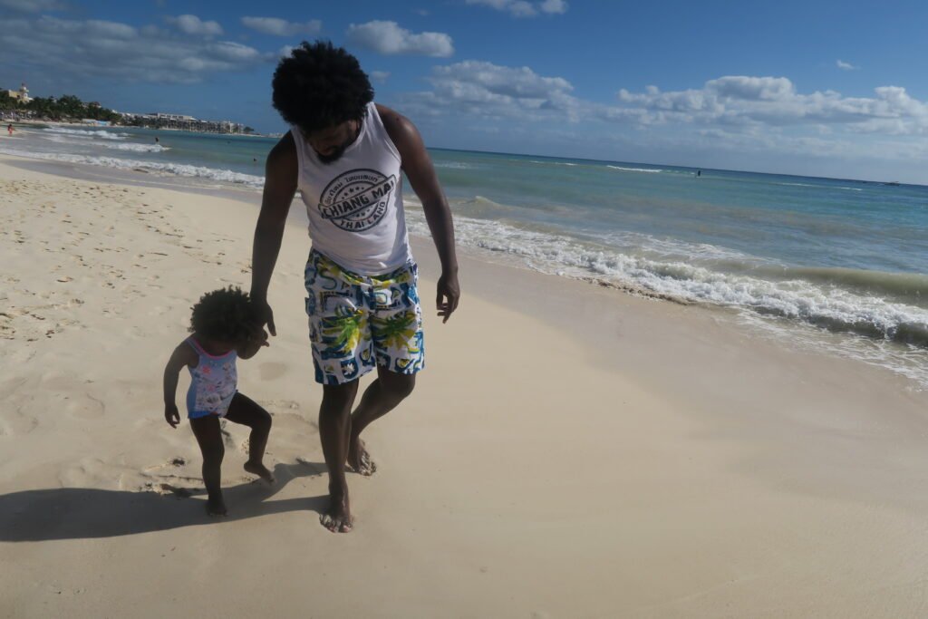African American father and daughter in Mexico, moving to a different country